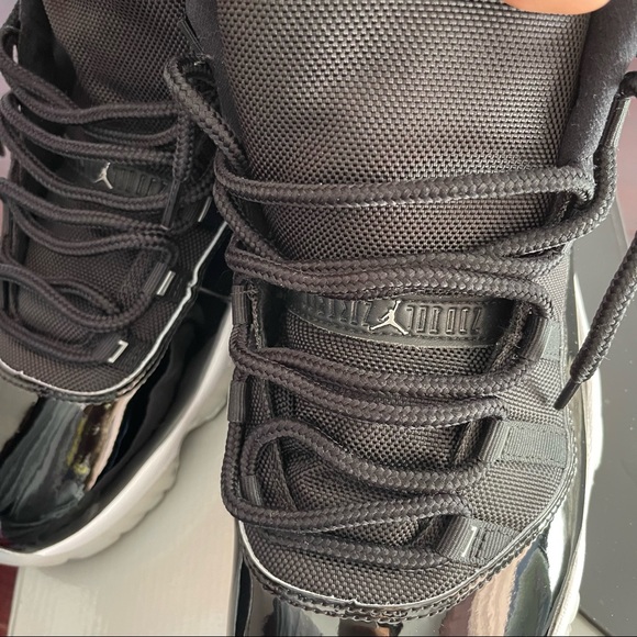 Air Jordan 11s Retro Black & White main image 9